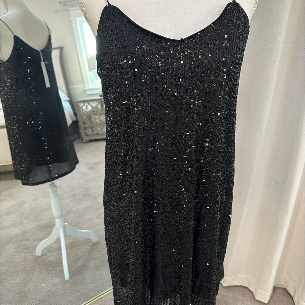 Black sequined cami dress with spaghetti straps